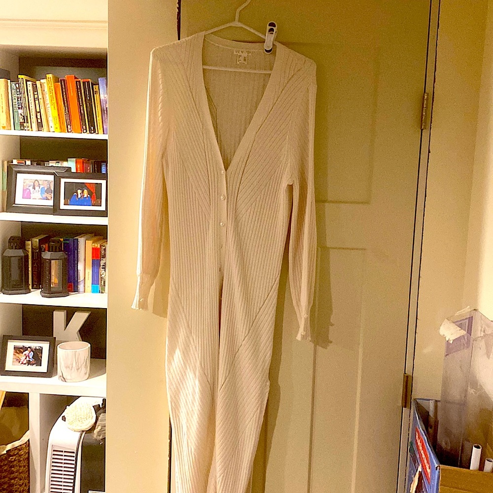 Venus cream duster sweater with pearl button embellishments. Worn once.